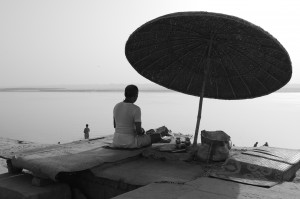 varanasi meditation under umbrella