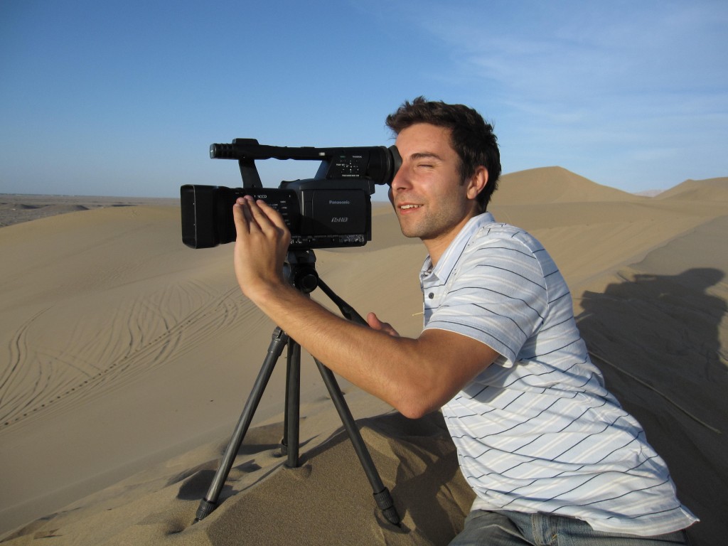 Brook Silva-Blaga shooting the giant sand dunes of Dunhuang in western China.